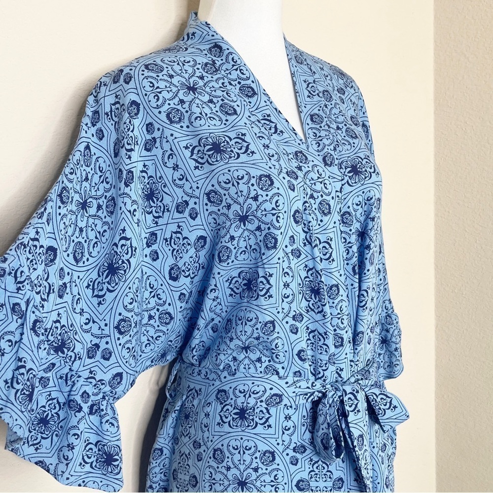 Ruby Ribbon Ruffle Wrap Blue Floral Top - Picture 6 of 13